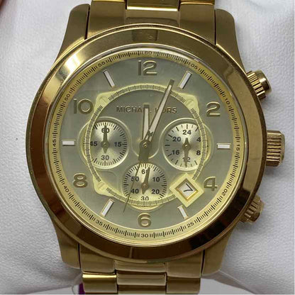 Pre-Owned Michael Kors Gold Metal Watch