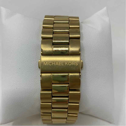 Pre-Owned Michael Kors Gold Metal Watch